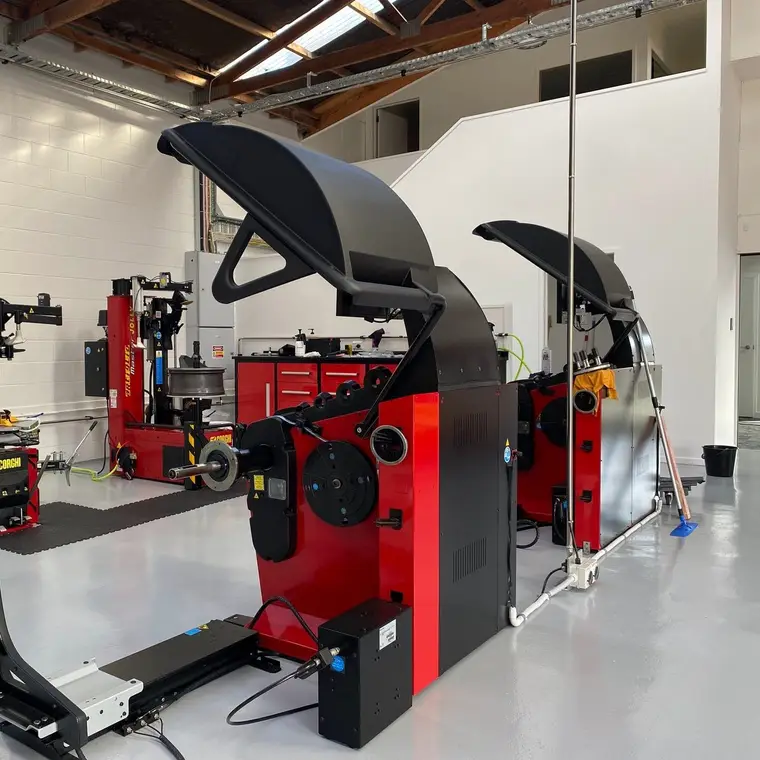 Tyre Lab's wheel balancing machine on the shop floor
